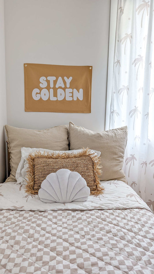 Fun kids wall banner featuring beachy, coastal fun words. Canvas banners feature matching interior design organic cotton sheets and kids bedding | The Cuddle Collective