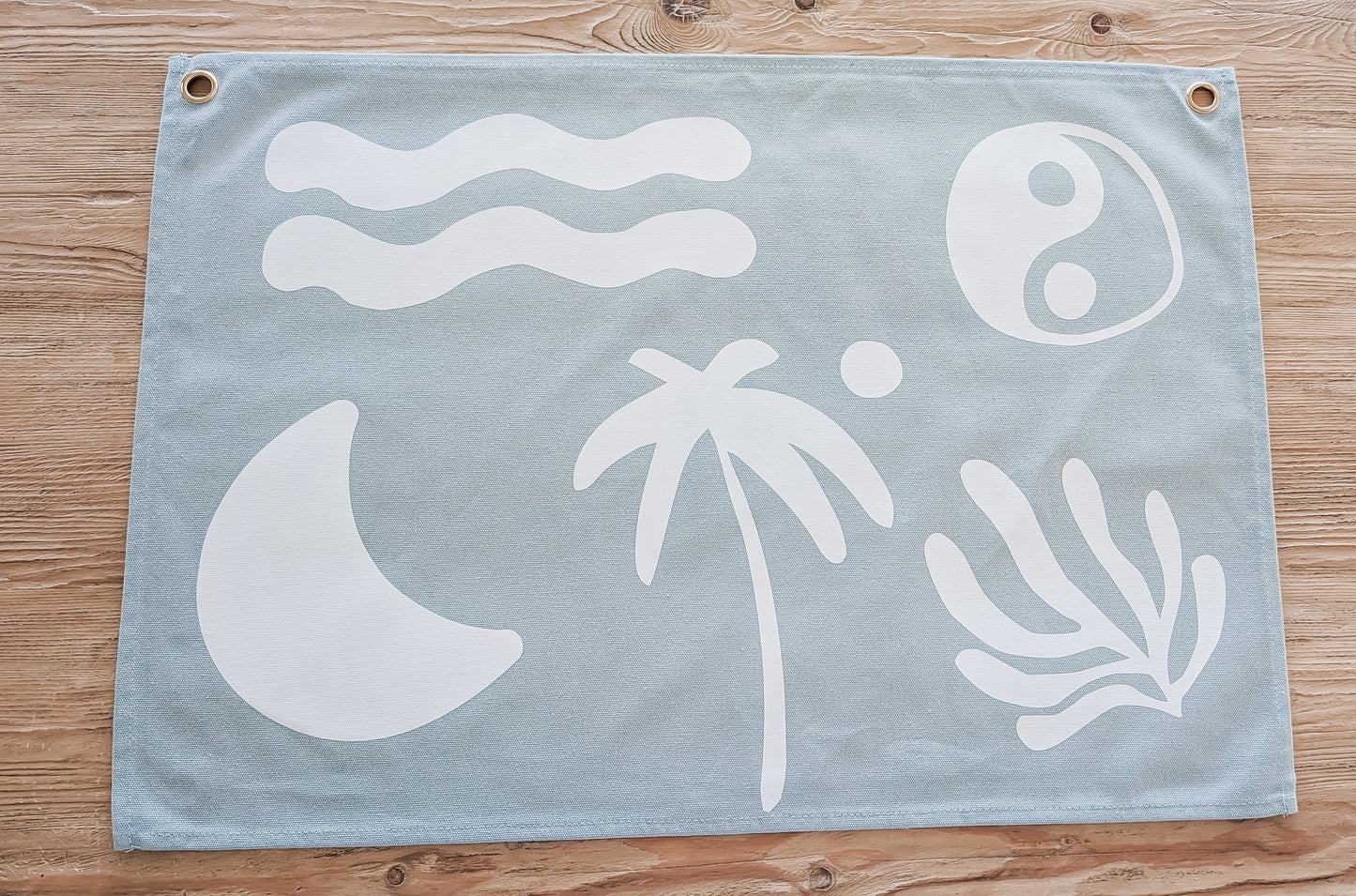 Fun kids wall banner featuring beachy, coastal fun words. Canvas banners feature matching interior design organic cotton sheets and kids bedding | The Cuddle Collective