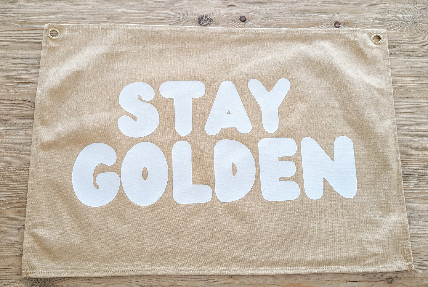 Fun kids wall banner featuring beachy, coastal fun words. Canvas banners feature matching interior design organic cotton sheets and kids bedding | The Cuddle Collective