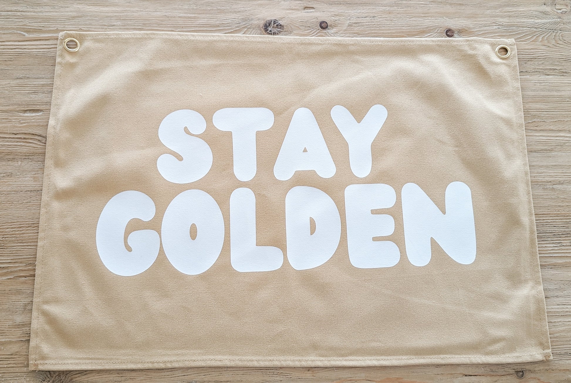 Fun kids wall banner featuring beachy, coastal fun words. Canvas banners feature matching interior design organic cotton sheets and kids bedding | The Cuddle Collective