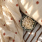 the cuddle collective reversible quilt featuring a teracorra star pattern and stripe kids sheet set