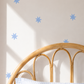 Fabric Wall Decal and fabric wall sticker in the shape of a blue star. It is a high quality fabric wall sticker that won't damage walls.