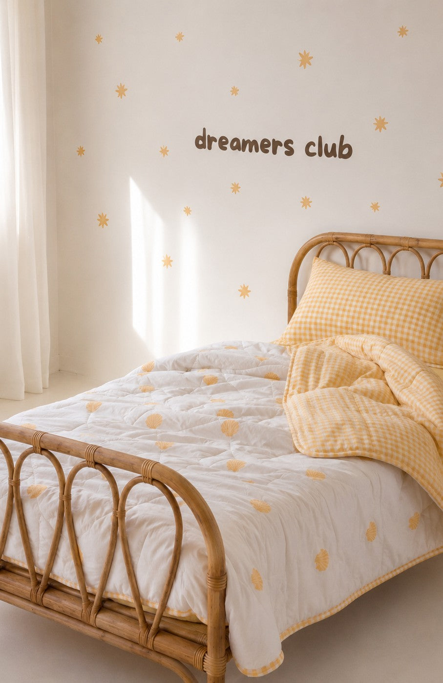 Fabric Wall Decal and fabric wall sticker that says dreamers club with yellow stars. It is a high quality fabric wall sticker that won't damage walls.