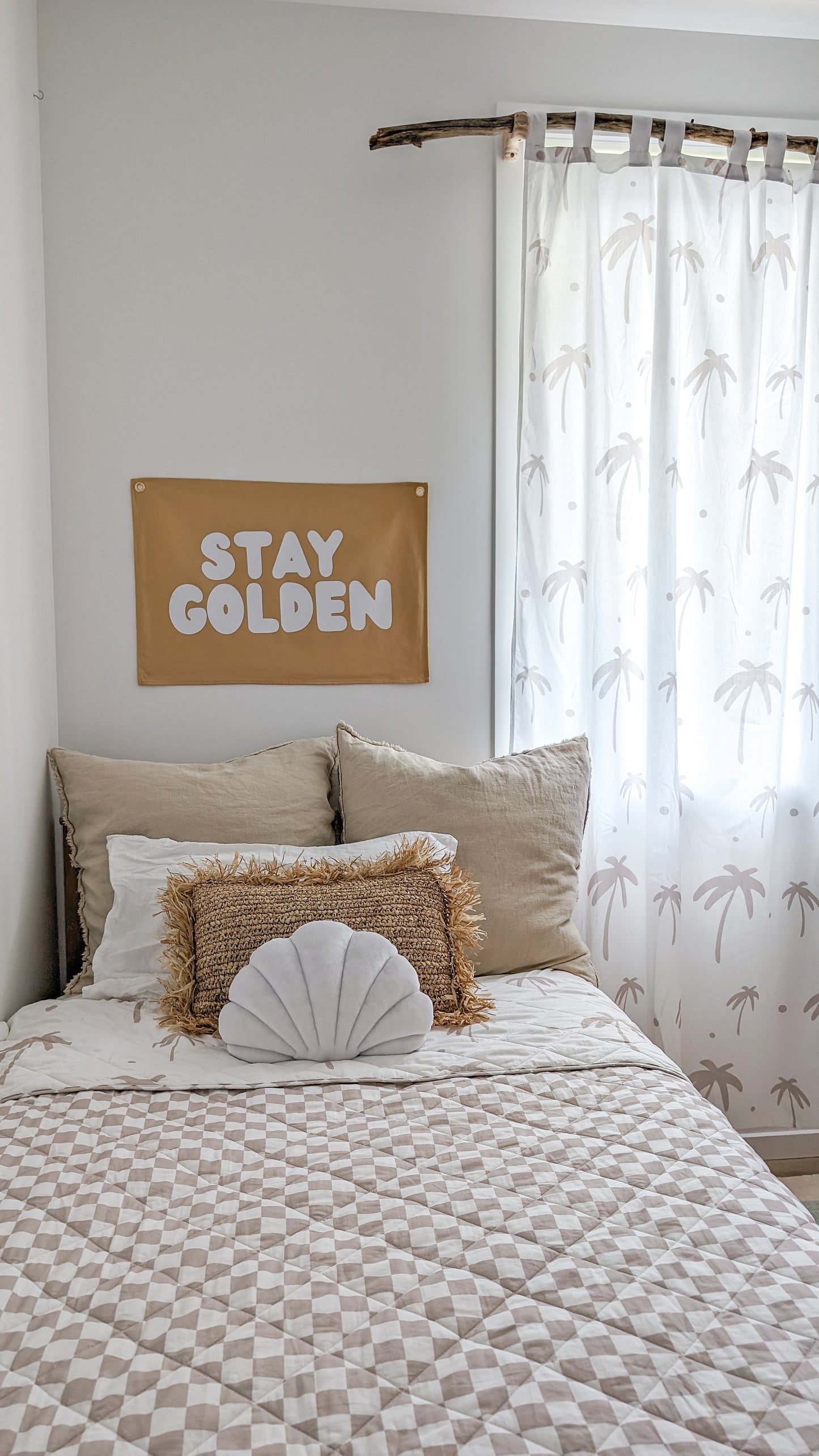 A neutral and coastal kids room featuring kids curtains made of organic cotton completes this cute coastal kids bedding look, an aesthetic kids bedroom, playroom, Montessori room | The Cuddle Collective