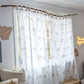 A neutral and coastal kids room featuring kids curtains made of organic cotton completes this cute coastal kids bedding look, an aesthetic kids bedroom, playroom, Montessori room | The Cuddle Collective