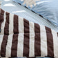 Cornflower blue and brown stripe reversible quilt and organic cotton bedding set