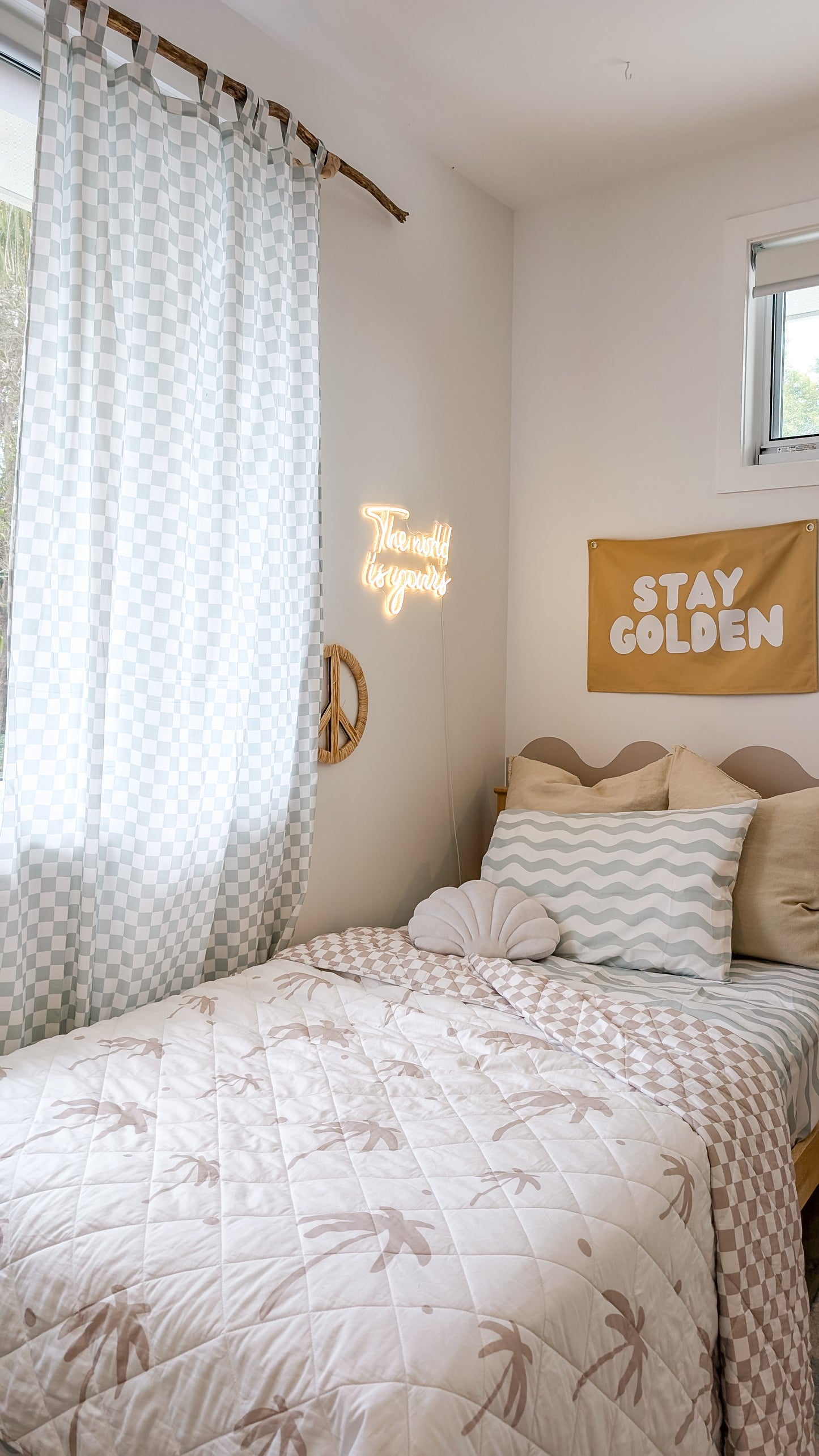 A neutral and coastal kids room featuring kids curtains made of organic cotton completes this cute coastal kids bedding look, an aesthetic kids bedroom, playroom, Montessori room | The Cuddle Collective