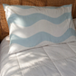 Baby Blue Waves organic cotton sheets with soft blue wave pattern