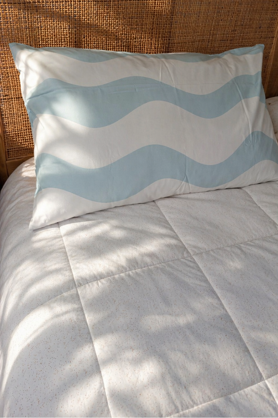 Baby Blue Waves organic cotton sheets with soft blue wave pattern