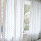A neutral and coastal kids room featuring kids curtains made of organic cotton completes this cute coastal kids bedding look, an aesthetic kids bedroom, playroom, Montessori room | The Cuddle Collective