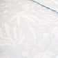 A neutral and coastal kids bed made with organic cotton sheets and organic cotton reversible quilt blanket with wavy stripe print completes this cute coastal kids bedding linen look | The Cuddle Collective