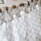A neutral and coastal kids room featuring kids curtains made of organic cotton completes this cute coastal kids bedding look, an aesthetic kids bedroom, playroom, Montessori room | The Cuddle Collective