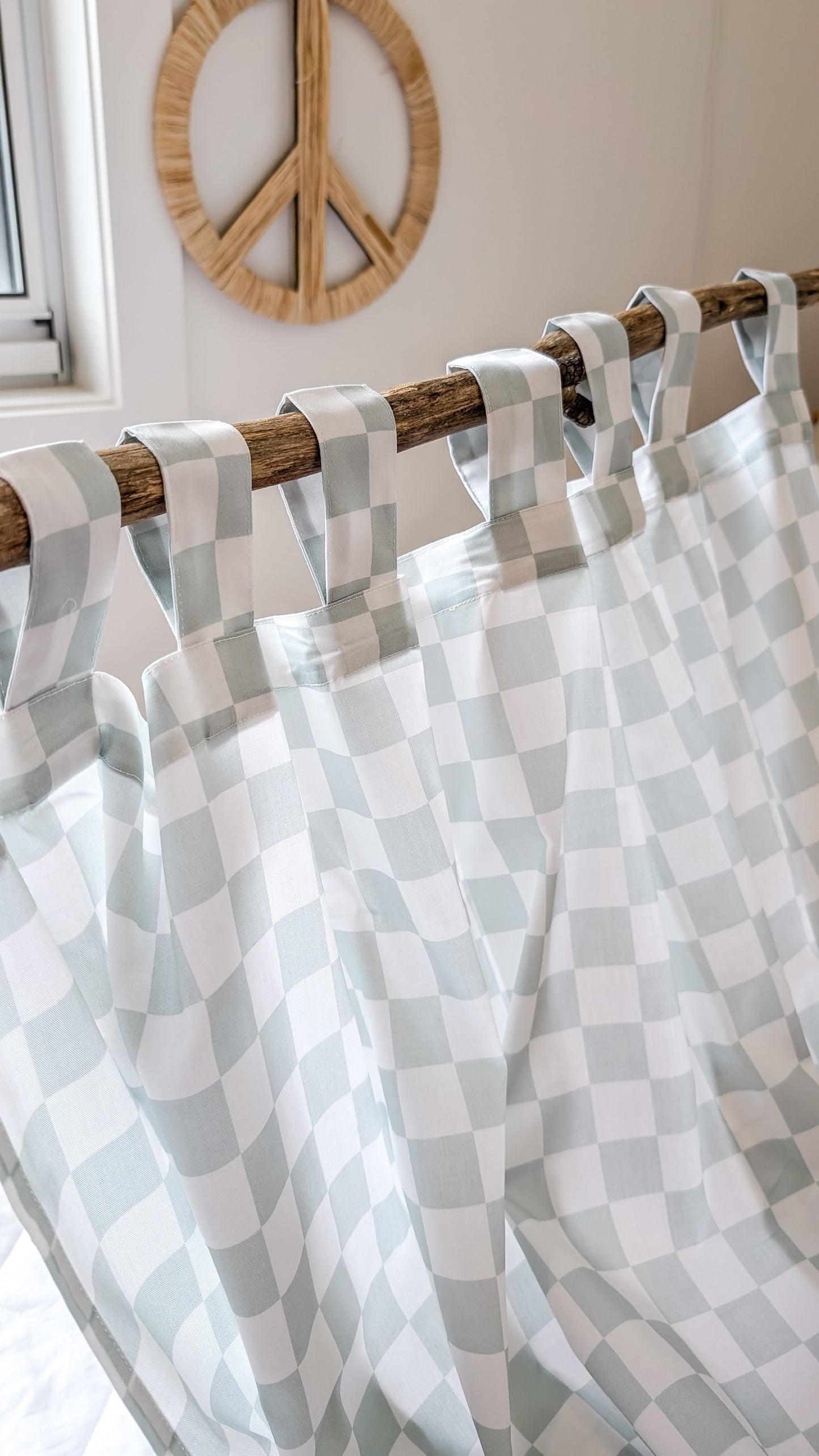 A neutral and coastal kids room featuring kids curtains made of organic cotton completes this cute coastal kids bedding look, an aesthetic kids bedroom, playroom, Montessori room | The Cuddle Collective