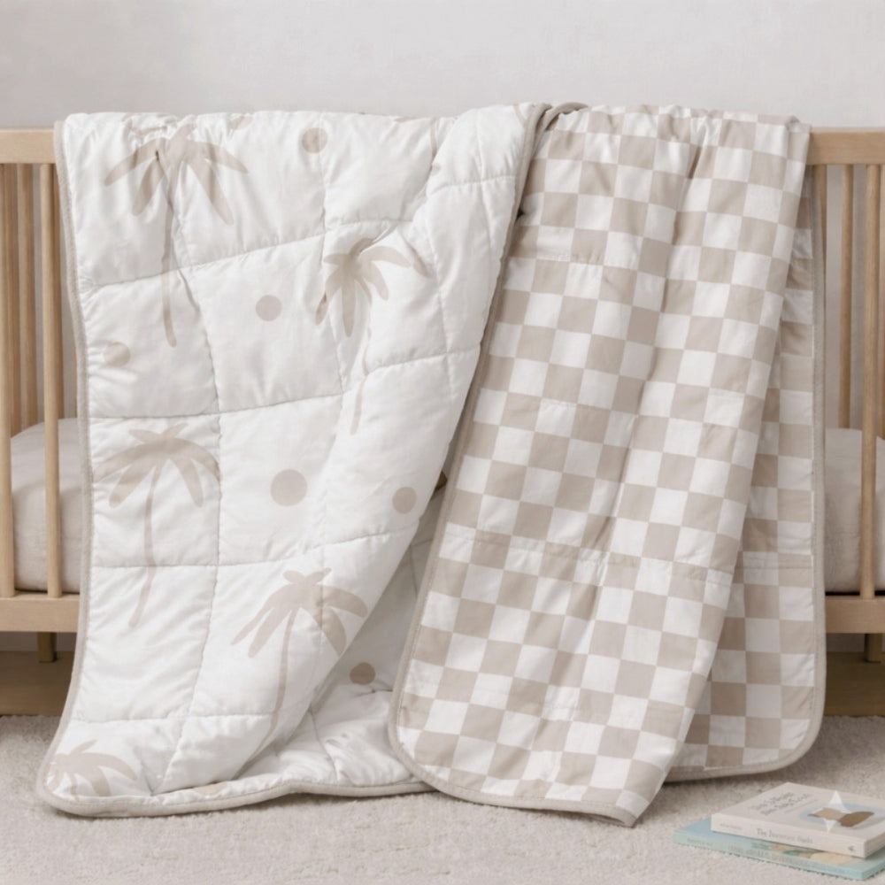 natural colour palm and checker double sided quilt in kids bedroom
