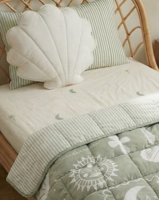 Sage Palm organic cotton sheets with soft green palm print and beachy theme styled in a cute modern kids bedroom