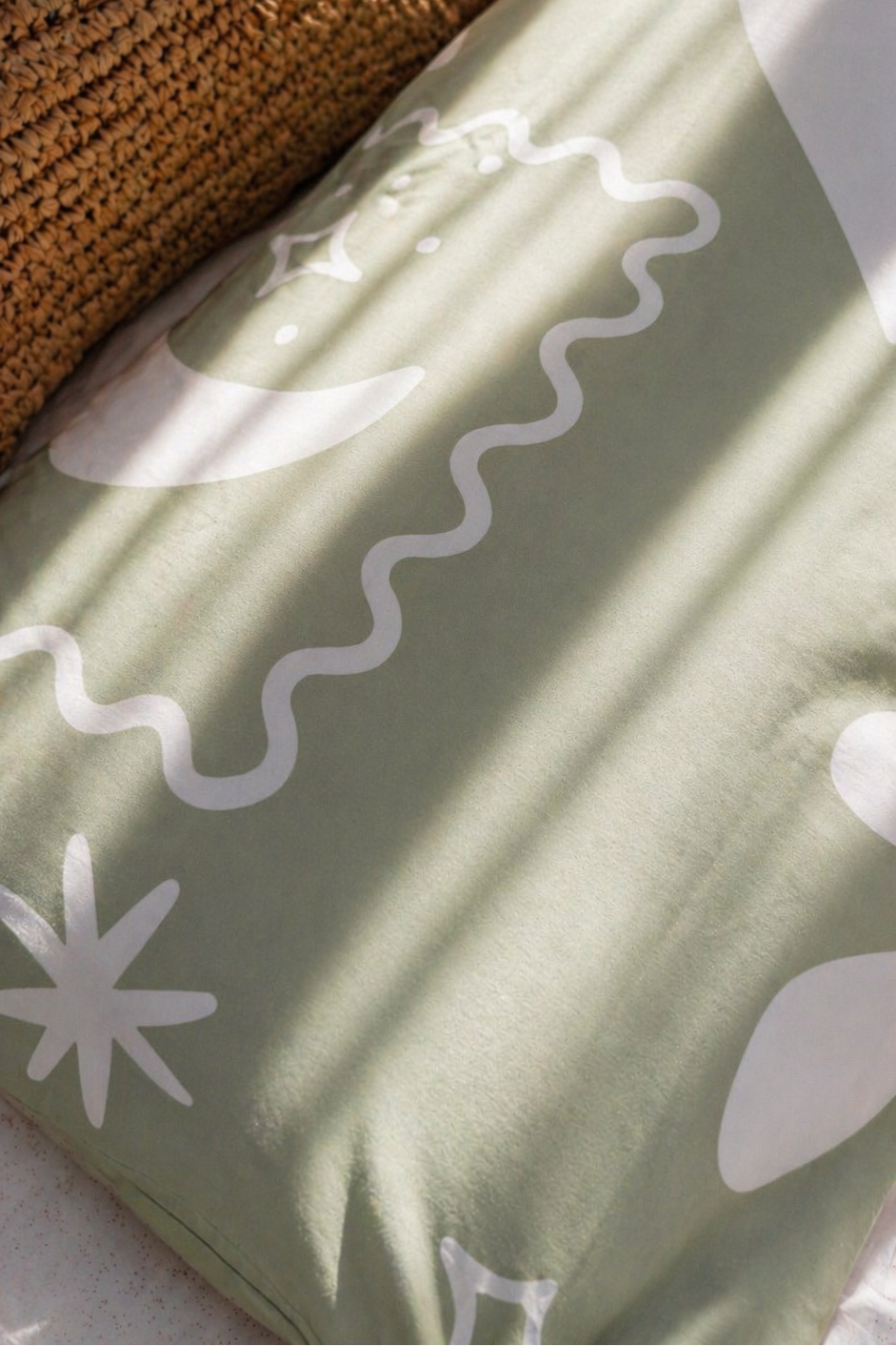 sage kids bedding with a beachy theme