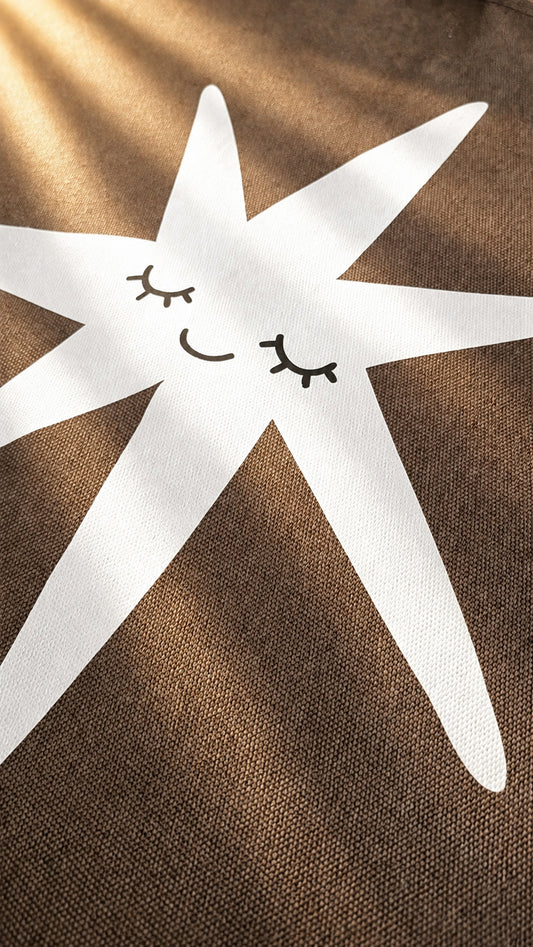 a star with a face on a kids cotton canvas wall banner for kids decor