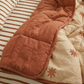 starfall reversible quilt and coco stripe sheet set paired together organic cotton bedding for kids