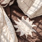 cotton filled double sided quilt with a stripe and sun print