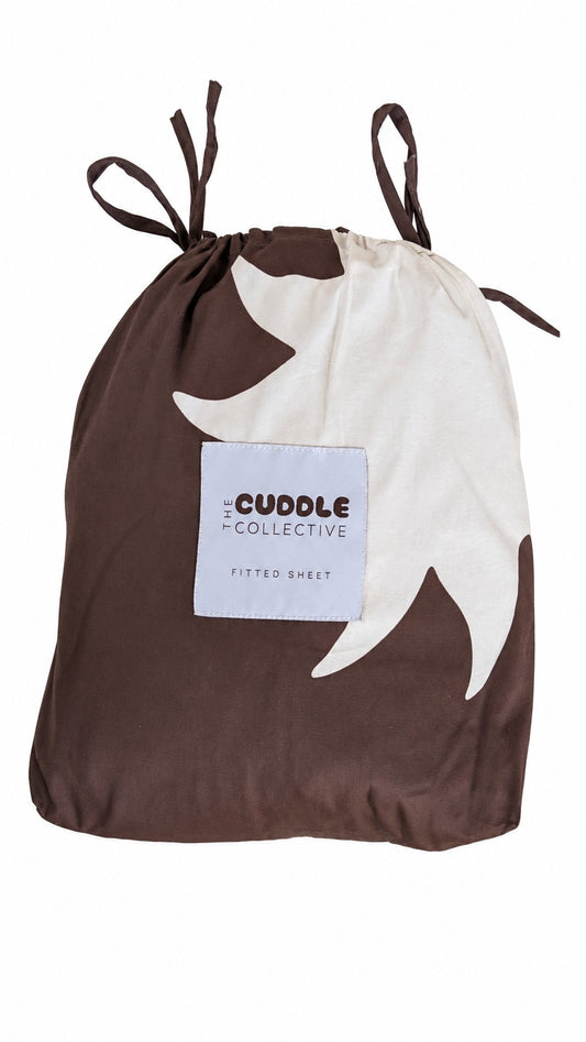 organic cotton fitted sheet featuring a sun print